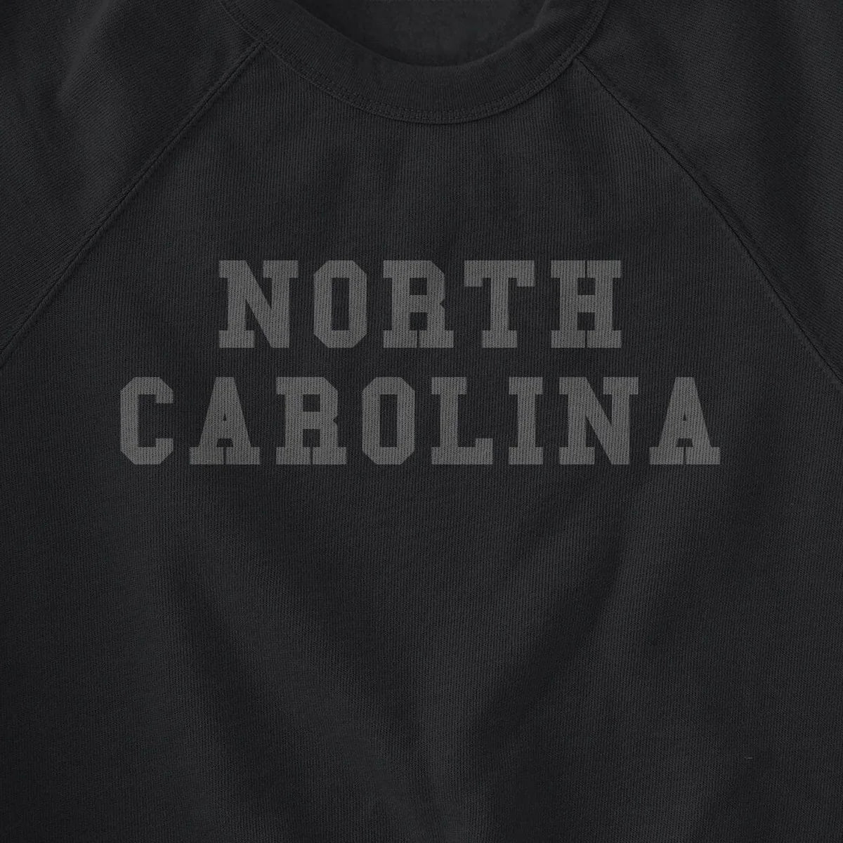 North Carolina Black on Black design close-up