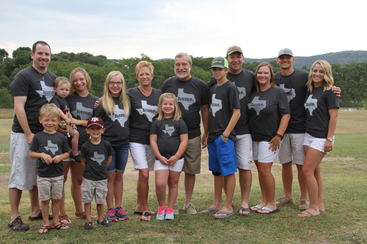 Group in state tees on a city street
