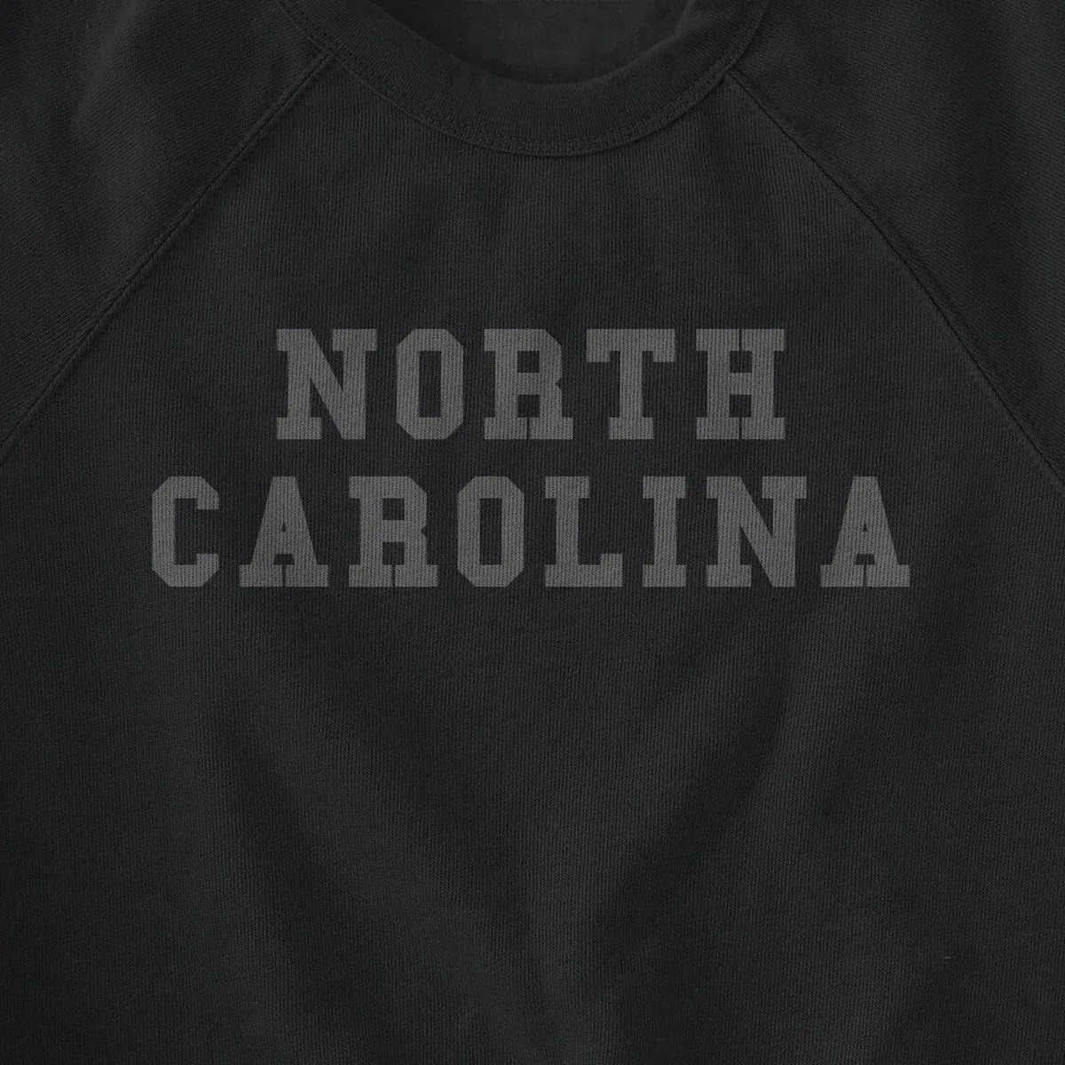 North Carolina Black on Black design close-up
